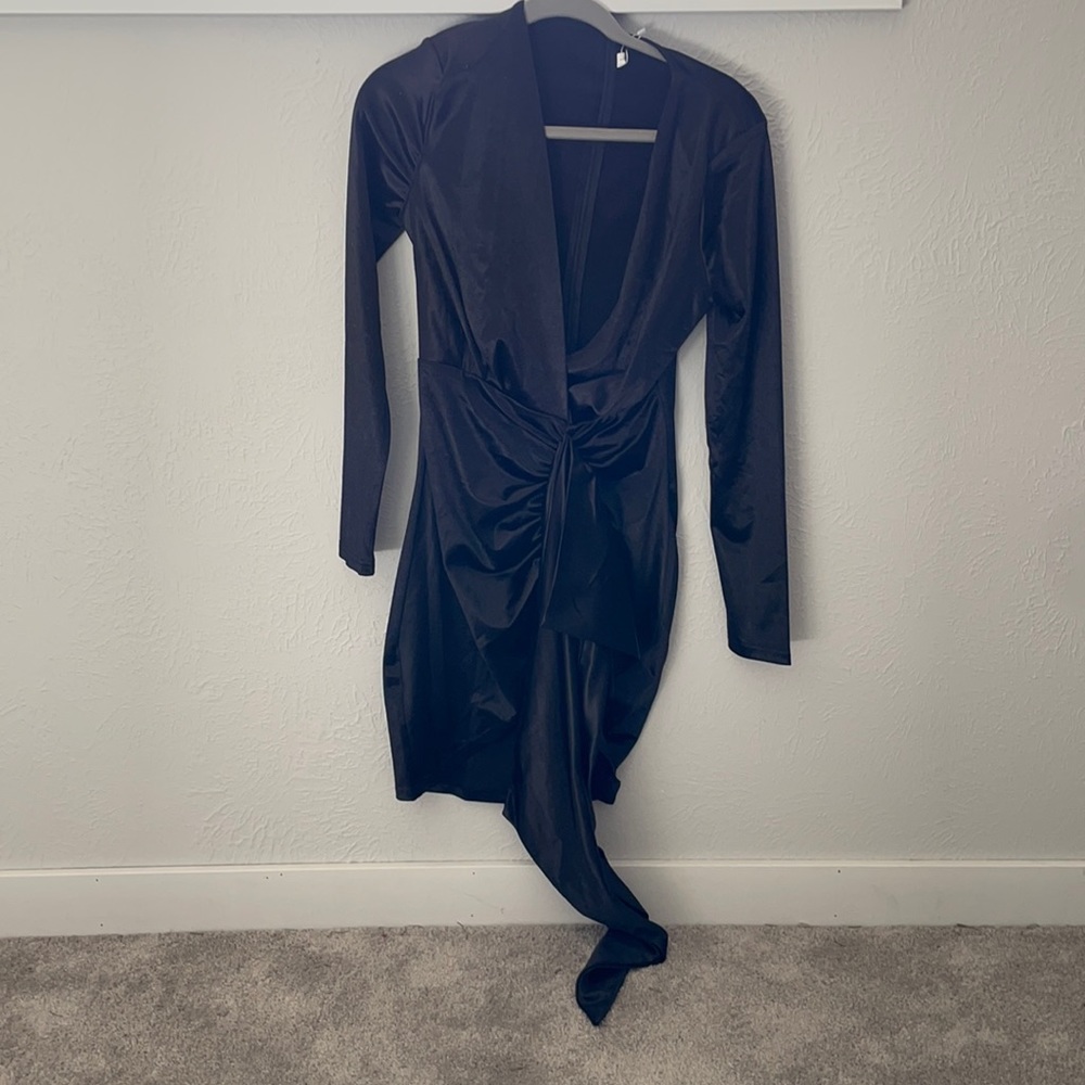 Black mini dress with minimal shoulder pads